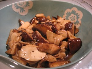 Stir fried mix mushrooms with pickled cucumber