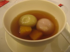 Custard glutinous dumplings with sweet potato ginger soup